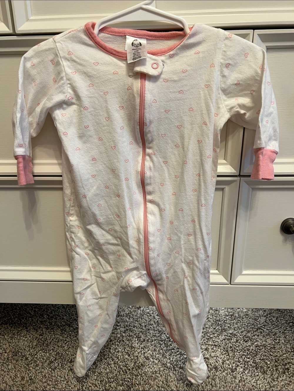 Gerber White Baby Footed Sleeper with Pink Trim and Heart Accents